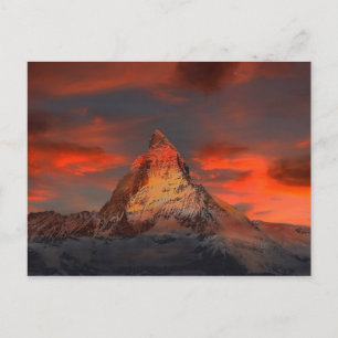 Ikoniska alpina bergarter Matterhorn vid solnedgån Vykort
