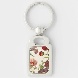 Illustration av blommande blommor med rosa och röd rektangulärt silverfärgad nyckelring