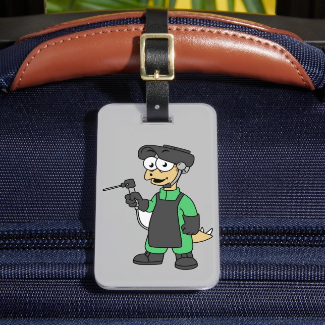 Illustration av en Stegosaurus Welder. Bagagebricka (Framsida Insitu 2)