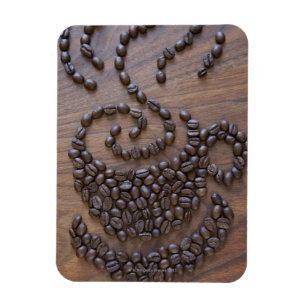 Illustrerad kaffekopp genom att använda kaffebön magnet