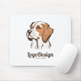 Illustrerad logotyp för en brun och vit hund musmatta
