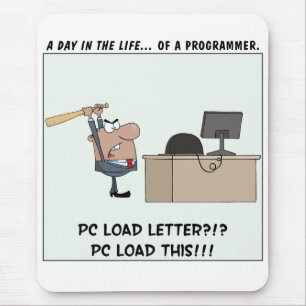 Ilsken programmerare slår datoren musmatta