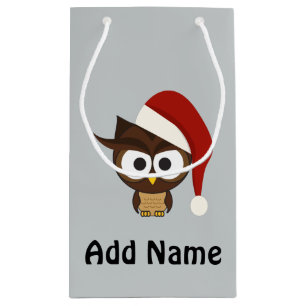 Ilsken uggla som ha på sig den Santa hatten
