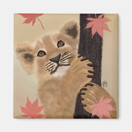 Ímã filhote de leão brincando magnet