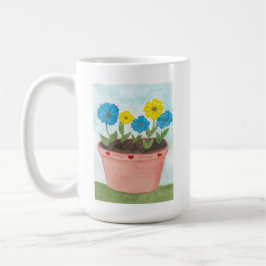Imaginära blommor i blomkruka med hjärtan kaffemugg