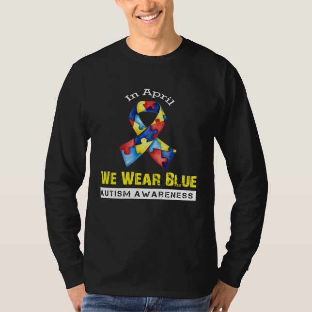 In April We Wear Blue Autism Awareness Month T Shirt (Framsida)
