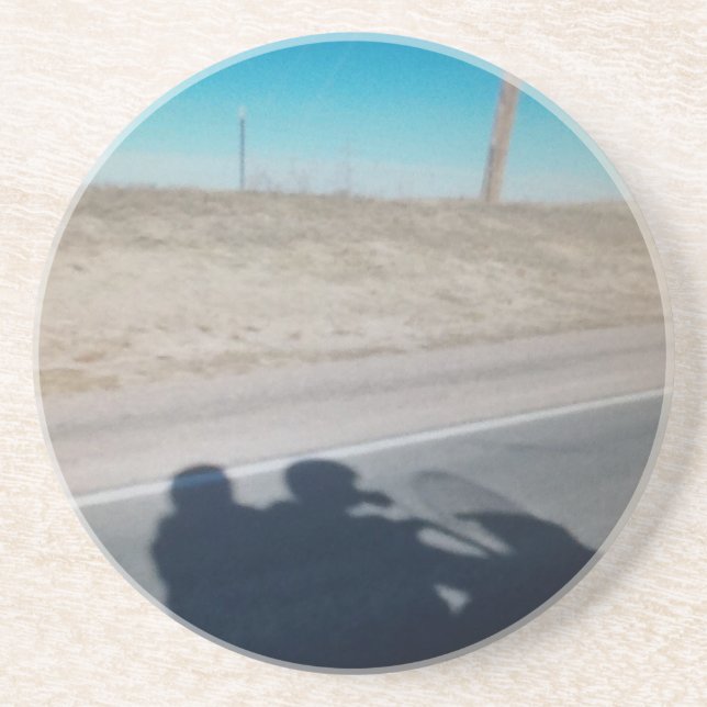 In i vildblåtten underlägg sandsten (Framsidan)