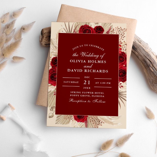 Inbjudan till Burgundy Ro och Pampas Grass Wedding (Burgundy Roses and Pampas Grass Wedding Invitation on table surrounded with pampas grass.)