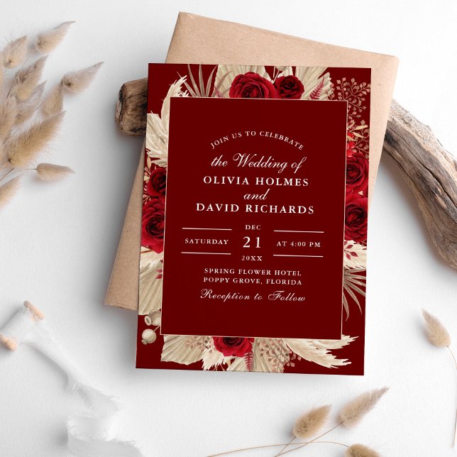 Inbjudan till Burgundy Ro och Pampas Grass Wedding (Burgundy Roses and Pampas Grass Wedding Invitation on a table surrounded with pampas grass.)