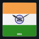 India Flag Dazzling Patriotic Square Fyrkantig Klocka<br><div class="desc">India Flag Dazzling Patriotic Square Wall Clock in the colors and the elements of the India national flag covering the front of the clock. National flag colors are complemented with the text "India" on the bottom. Text is fully customizable using "Customize it!" feature. Feel free to change it, remove it...</div>