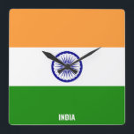 India Flag Dazzling Patriotic Square Fyrkantig Klocka<br><div class="desc">India Flag Dazzling Patriotic Square Wall Clock in the colors and the elements of the India national flag covering the front of the clock. National flag colors are complemented with the text "India" on the bottom. Text is fully customizable using "Customize it!" feature. Feel free to change it, remove it...</div>
