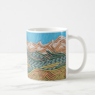 Indier nå en höjdpunkt kaffekoppen kaffemugg