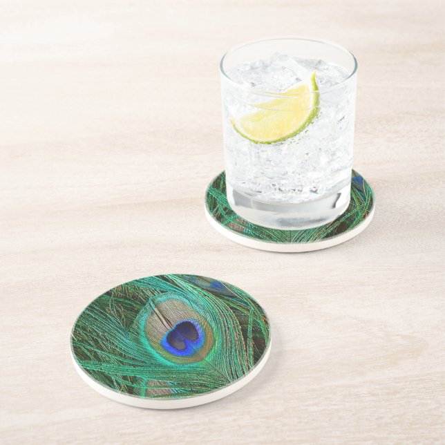 Indisk blåttpåfågelfjäder underlägg sandsten (Sidan)