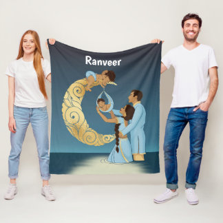 Indiska föräldrar välsignas med baby fleecefilt