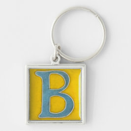 initial b-keychain som är ljusa - blått och gult fyrkantig silverfärgad nyckelring