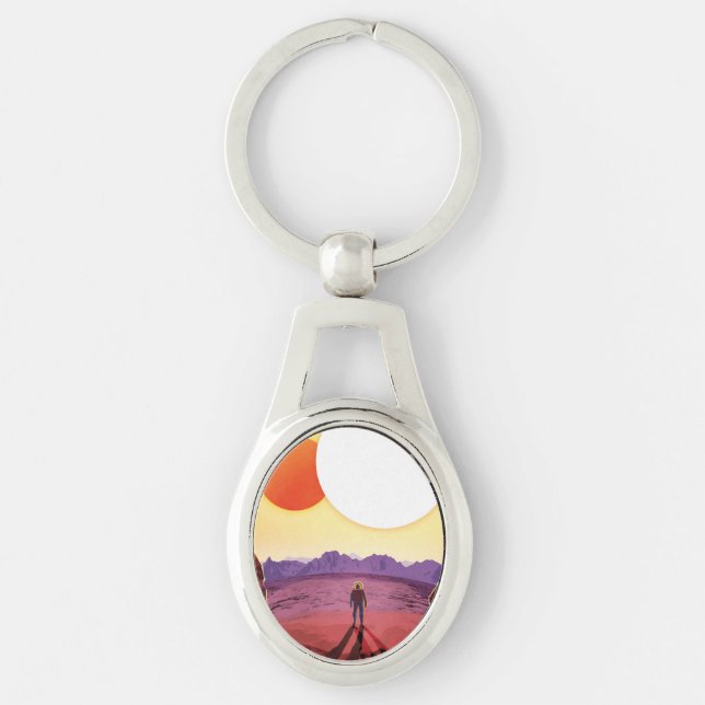 Innehåller utrymmesresmål Planet Äventyr Ovalt Silverfärgad Nyckelring (Framsidan)