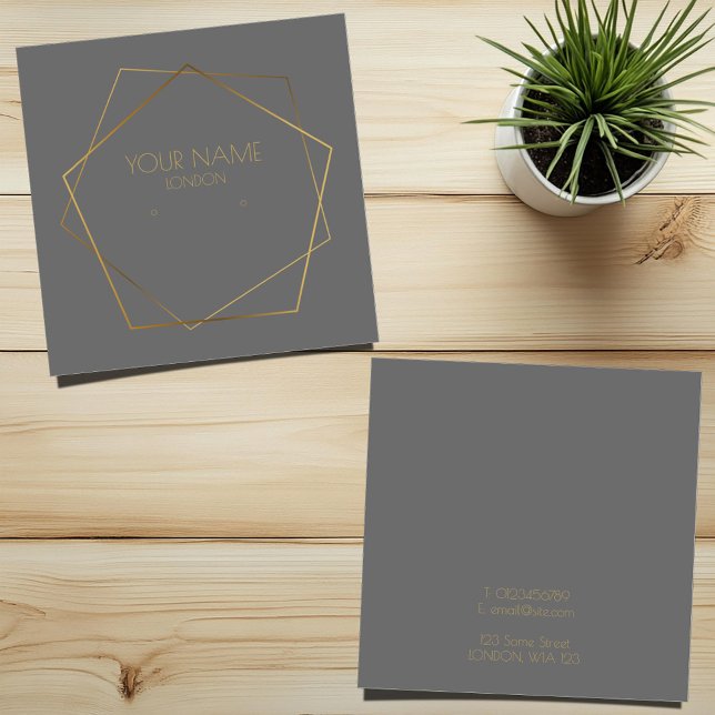Innehavare av geoometrisk guld pentagon grått-öron fyrkantigt visitkort (Grey and gold stud earring display card with geometric frame)