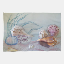 Insamling av Seashells på kökshandduk