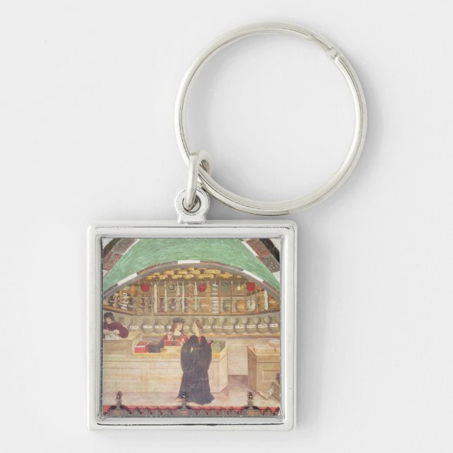 Insida av ett apotek fyrkantig silverfärgad nyckelring (Framsidan)