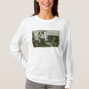 Insidan beskådar av ett New England hemman T-shirt