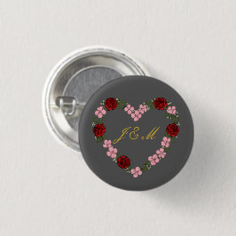 Insigne gris avec un cœur rose et rouge knapp
