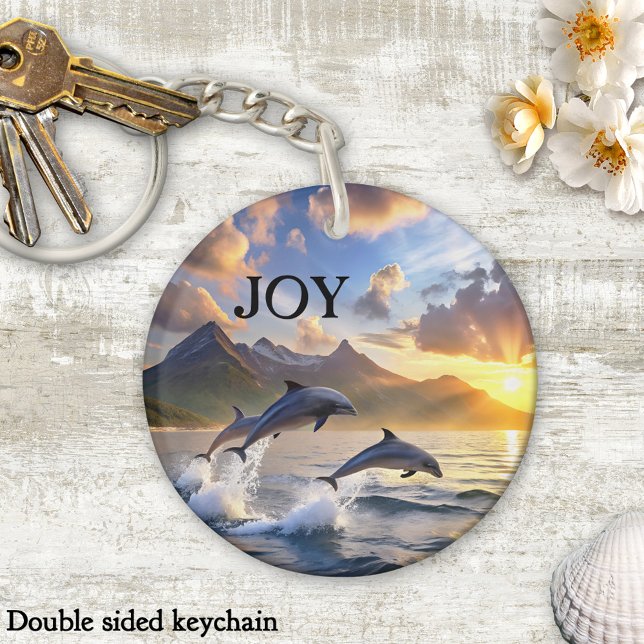 Inspirational Dolphins Sunset Mountains Joy (Keychain featuring playful dolphins jumping from the ocean at sunset)