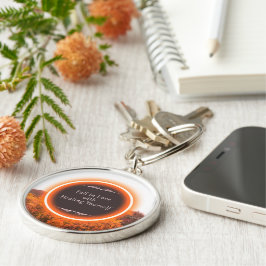 inspirationellt flöde rund silverfärgad nyckelring