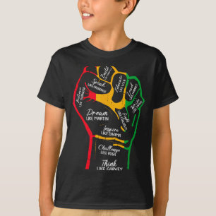 Inspirerande svarta ledare kraft näve hand svarta t shirt