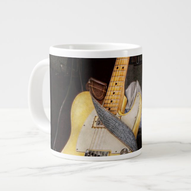 Instrument - Gitarr - Spelar i ett band Jumbo Mugg (Framsida vänster)