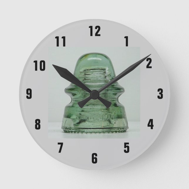 INSULATOR klocka (Framsida)