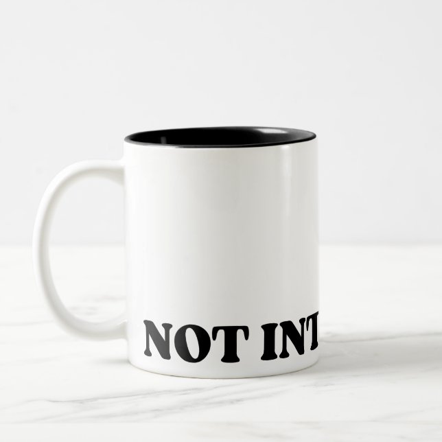 Inte Intresserad Retro Typografisk Tvåtons Mugg (Vänster)