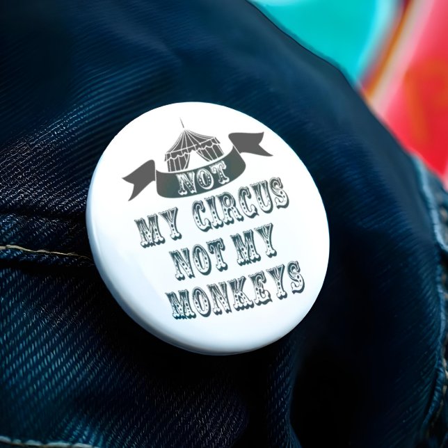 Inte min cirkus, inte mina apor knapp (Think of it as a funny way of saying to a work colleague that it ain't your problem. )