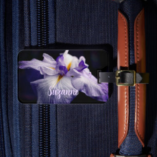 Intensifierad japansk irisblomma, stäng upp Person Bagagebricka