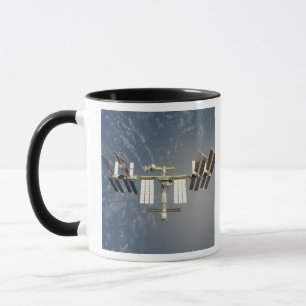Internationell backdropped utrymmestation mugg