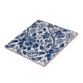 Intricate blue floral pattern on light background kakelplatta