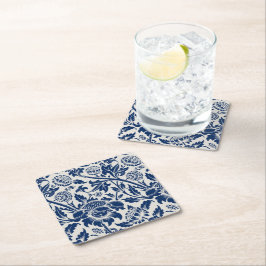 Intricate blue floral pattern on light background underlägg papper kvadrat