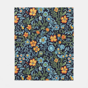 Intrikat blomsterkonst: Blå och orange blommor Fleecefilt
