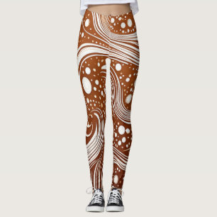 Intrikat elegans: Vit design på bruna leggings