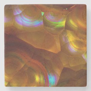 Iriserande orange eldfire opal underlägg sten