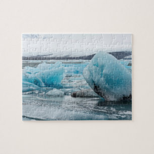 Is i glaciallagunen Jokulsarlon Pussel