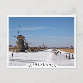 Isbeklädnad längs väderkvarnarna på vintern vykort