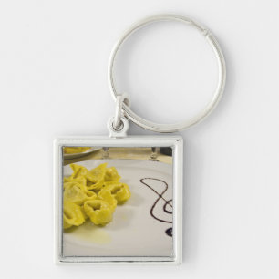Italien, Cento. En tallrik osttortellini Fyrkantig Silverfärgad Nyckelring