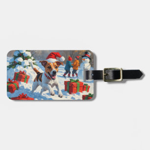 Jack Russell som springer i snö med julhatt Bagagebricka
