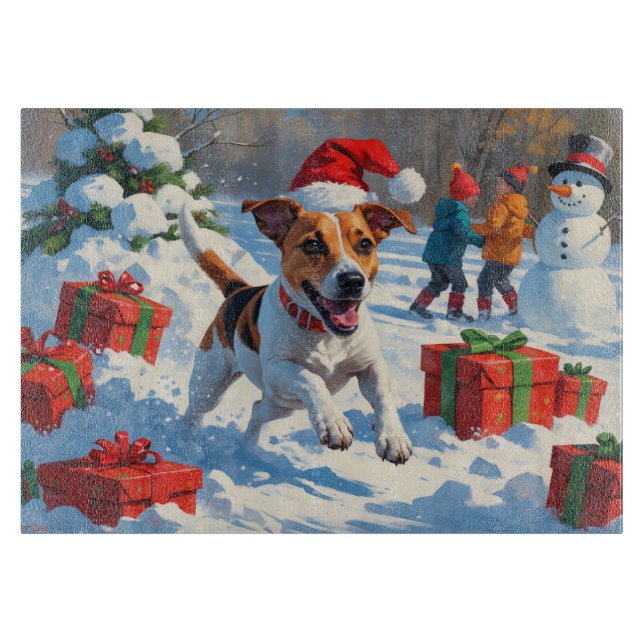 Jack Russell springer i snö med julhatt (Framsidan)