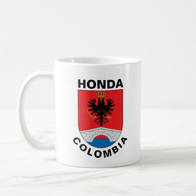 Jackande av Arm Honda (Tolima), Colombia Kaffemugg (Vänster)