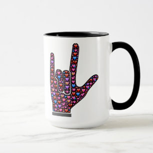 Jag älskar dig räcker tecken som fylls med mugg