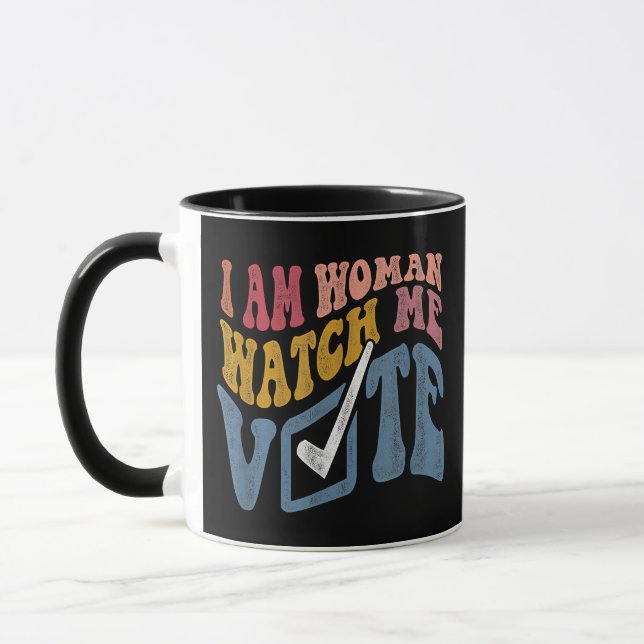 Jag är kvinna och ser mig rösta 2024. mugg (Vänster)