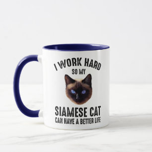 Jag arbetar hårt så att mina siameser kan få et mugg