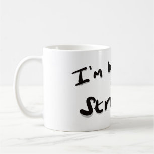 Jag breder ut en stark kaffemugg