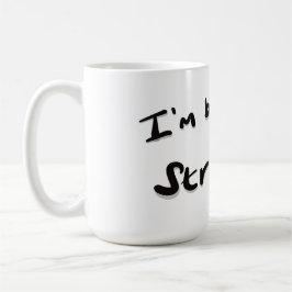 Jag breder ut en stark kaffemugg